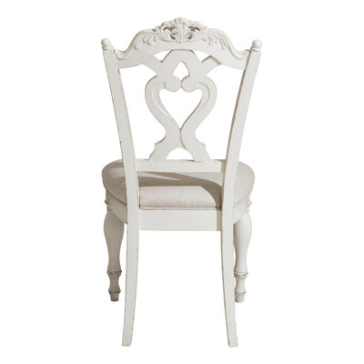 Antique Desk Chair With Cushioned Seat And Traditional Carving
