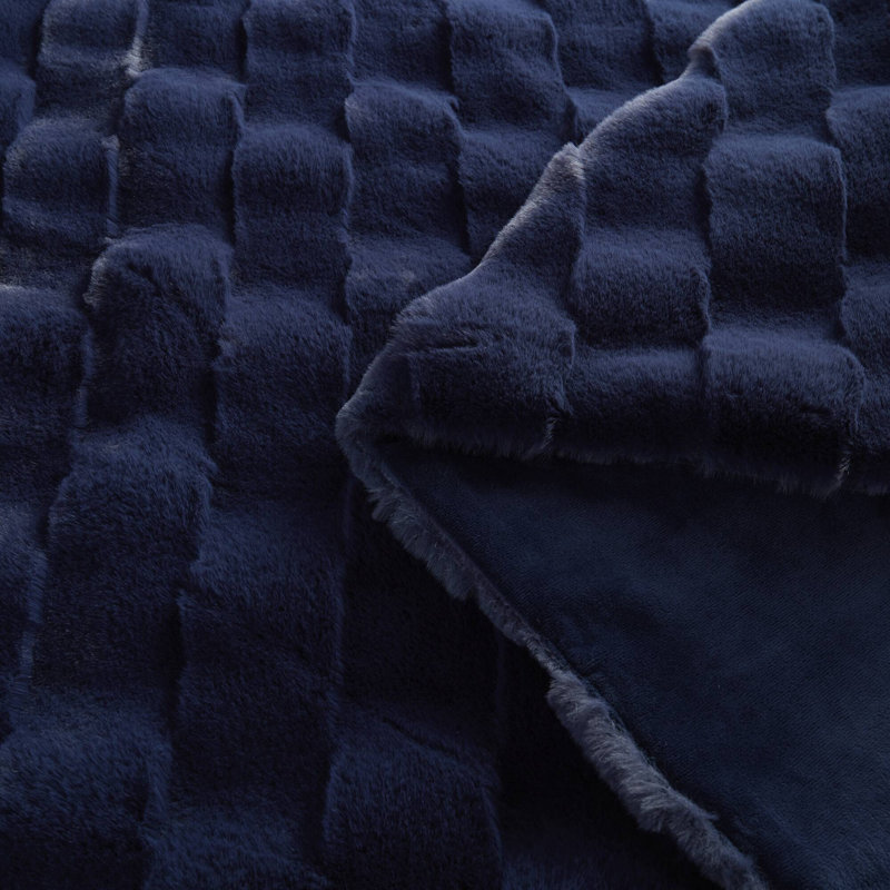 Jeté confortable en fausse fourrure de polyester pour un confort à la maison élégant