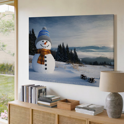 Canvas A Cheerful Snowman Stands In A Serene Winter Landscape Adorned Wall Art With A Blue And Gray Striped Hat And A Cozy Creating Canvas Wall Art