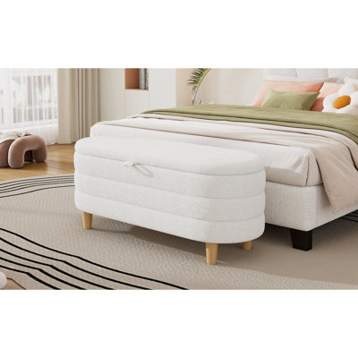 Repose-pieds élégant avec rangement en tissu Sherpa rembourré avec pieds en bois, banc de rangement pour chambre à coucher, salon, blanc