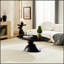 Table basse elliptique en forme de pierre Lucky, conception minimaliste moderne avec base sculpturale pour les salons et les appartements