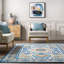 Tapis bleu à motif floral Kujawa-19006692