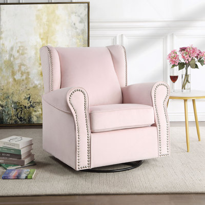 Fauteuil oscillant rose en tissu avec pivot