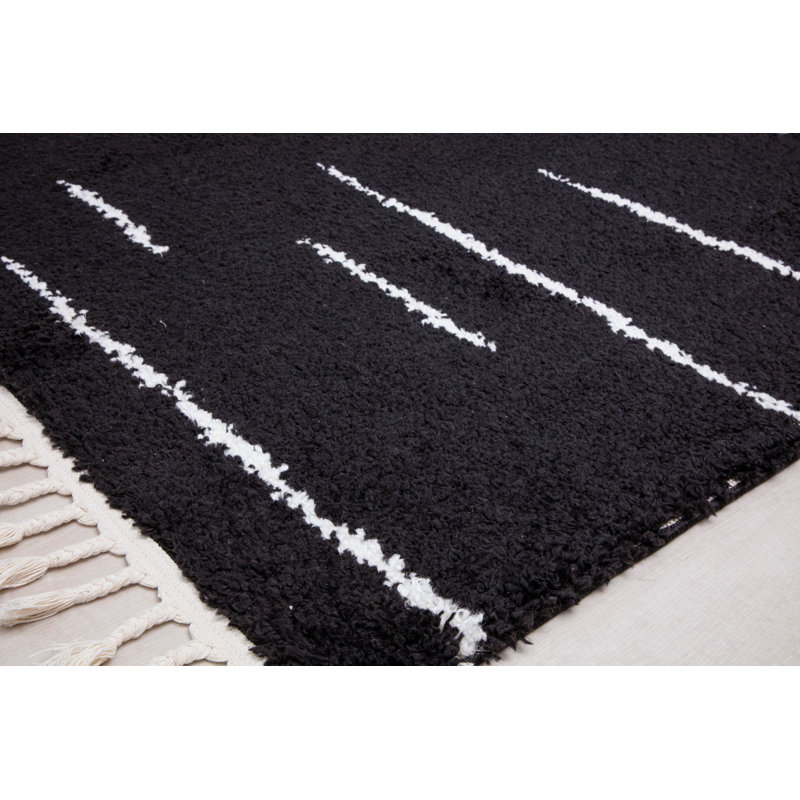 Introspective Black Abstract Shag Synthetic Area Rug with Braided Tassels