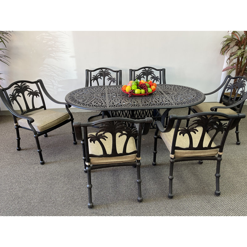 Alesha-Mae 6 - Person Patio Dining Set Umbrella Hole Included Table, with Sunbrella® Cushions Included, 29" H x 72" L x 42" W