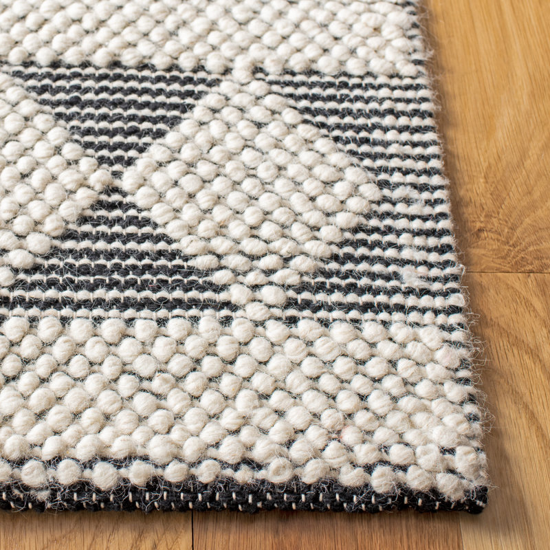 Handmade Black and Ivory Geometric Wool Area Rug