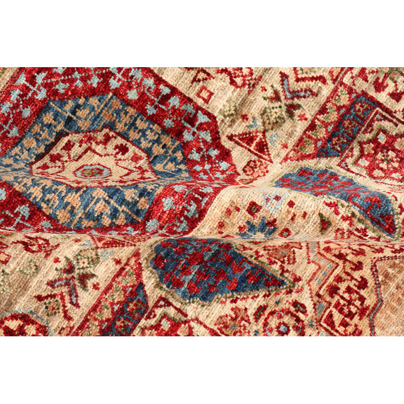 Tapis oriental en laine noué à la main en rouge / beige / bleu