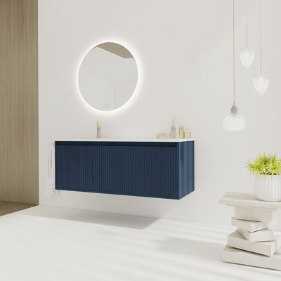 Meuble-lavabo flottant avec lavabo en résine en forme de goutte