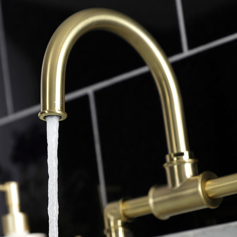 Kingston Brass Belknap Two-Handle 2-Hole Deck Mount Bridge Bathroom Faucet with Pop-Up Drain, Brushed Brass