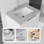 Meuble-lavabo suspendu de 61 cm (24 po) avec comptoir et dosseret en marbre reconstitué, armoire en contreplaqué, lavabo en céramique, portes à fermeture amortie, blanc-419845605