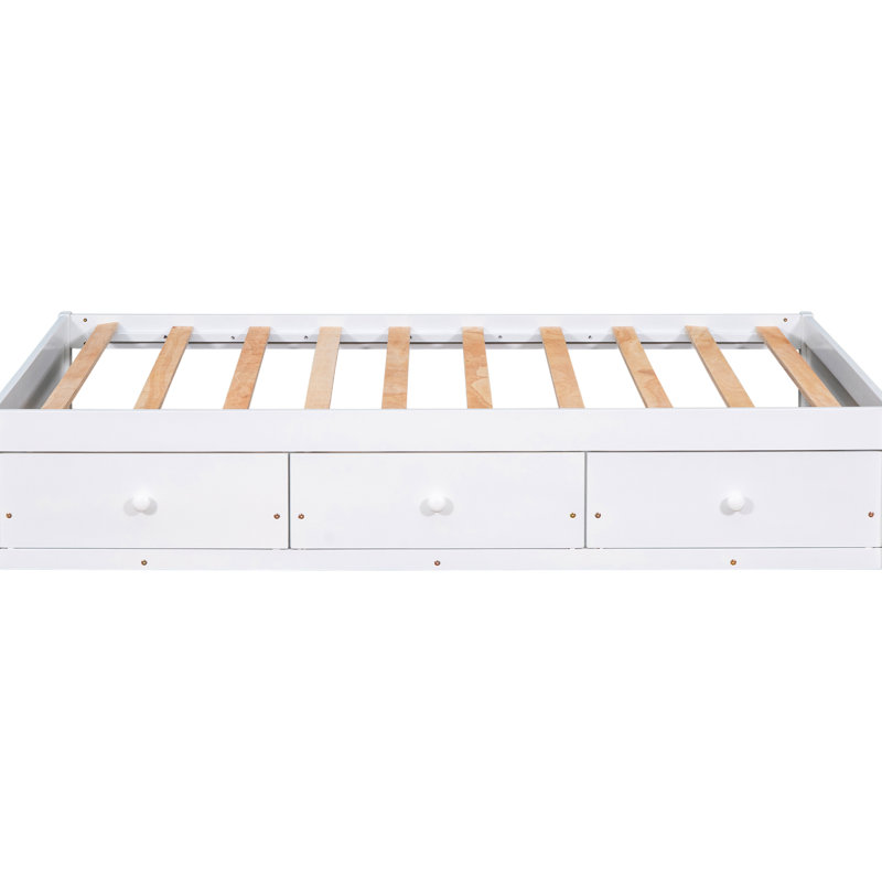 Lit simple blanc avec structure en bois massif et compartiment de rangement à 3 armoires