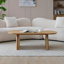 Table basse scandinave Elegance avec plateau elliptique et pieds en arc