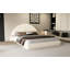Grand lit avec petite table Boucle
