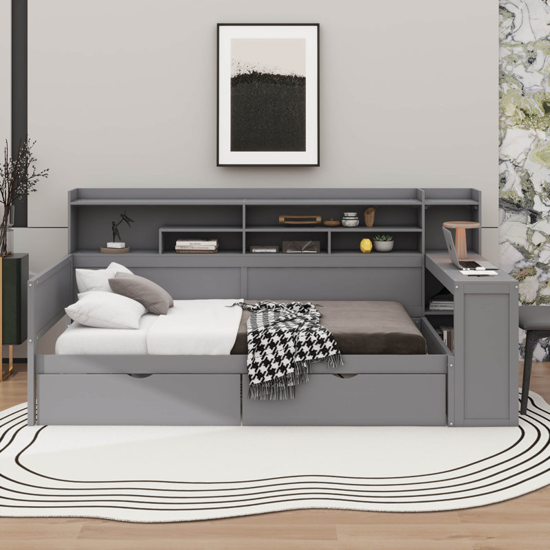 Lit de jour en bois équipé de tablettes de rangement, d'un design multifonctionnel comprenant deux tiroirs de rangement et un bureau d'étude