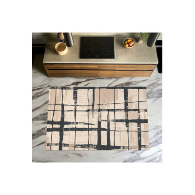 Tapis à motif géométrique rayé noir