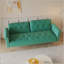 Un canapé-lit de 69,7 pouces de long recouvert de tissu de velours, avec une garniture cloutée et un coussin décoratif assorti-606242918