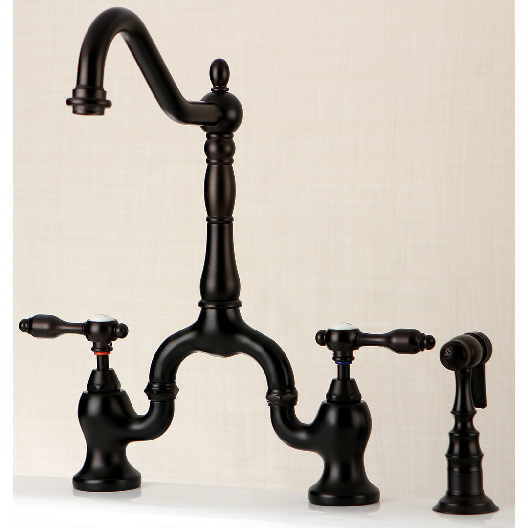 Kingston Brass Tudor Two-Handle 3-Hole Deck Mount Bridge Kitchen Faucet with Brass Side Sprayer Kingston Brass