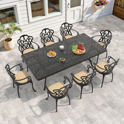  Tameia 8 - Person Patio Dining Set with , Off-White Cushions Included