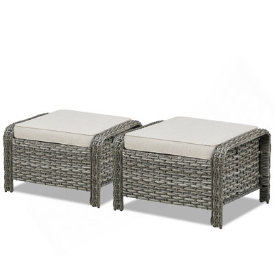 Ensemble de 2 repose-pieds d'extérieur en rotin gris avec coussin beige pour cour ou terrasse
