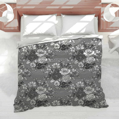 Édredon gris à motif floral