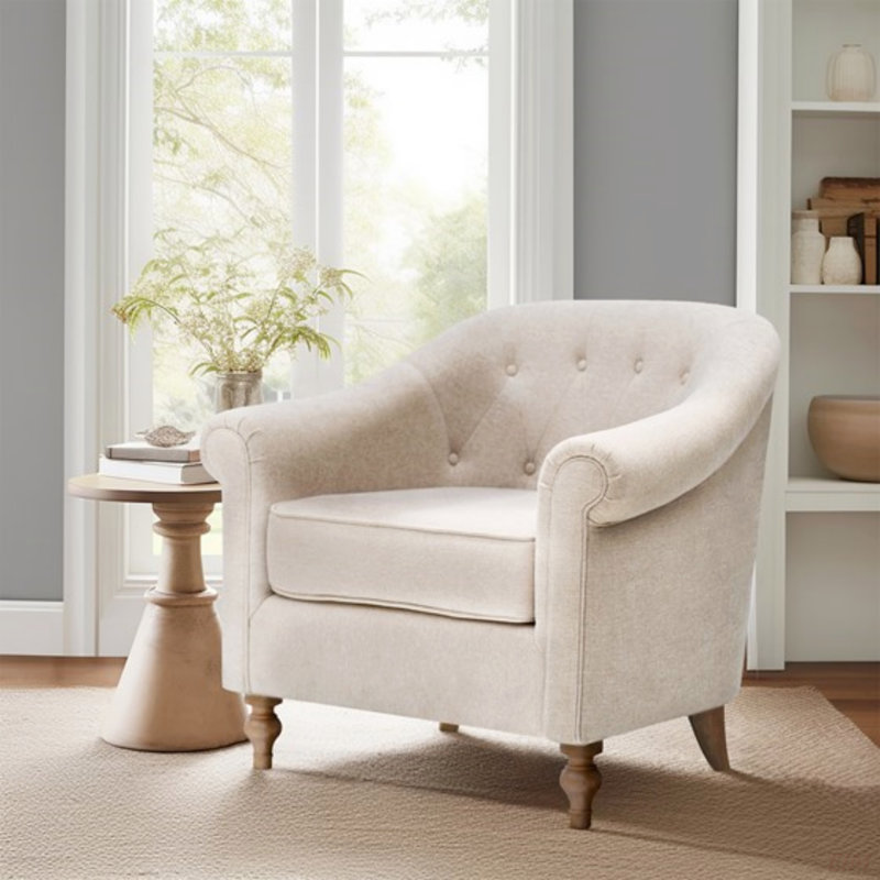 Fauteuil capitonné