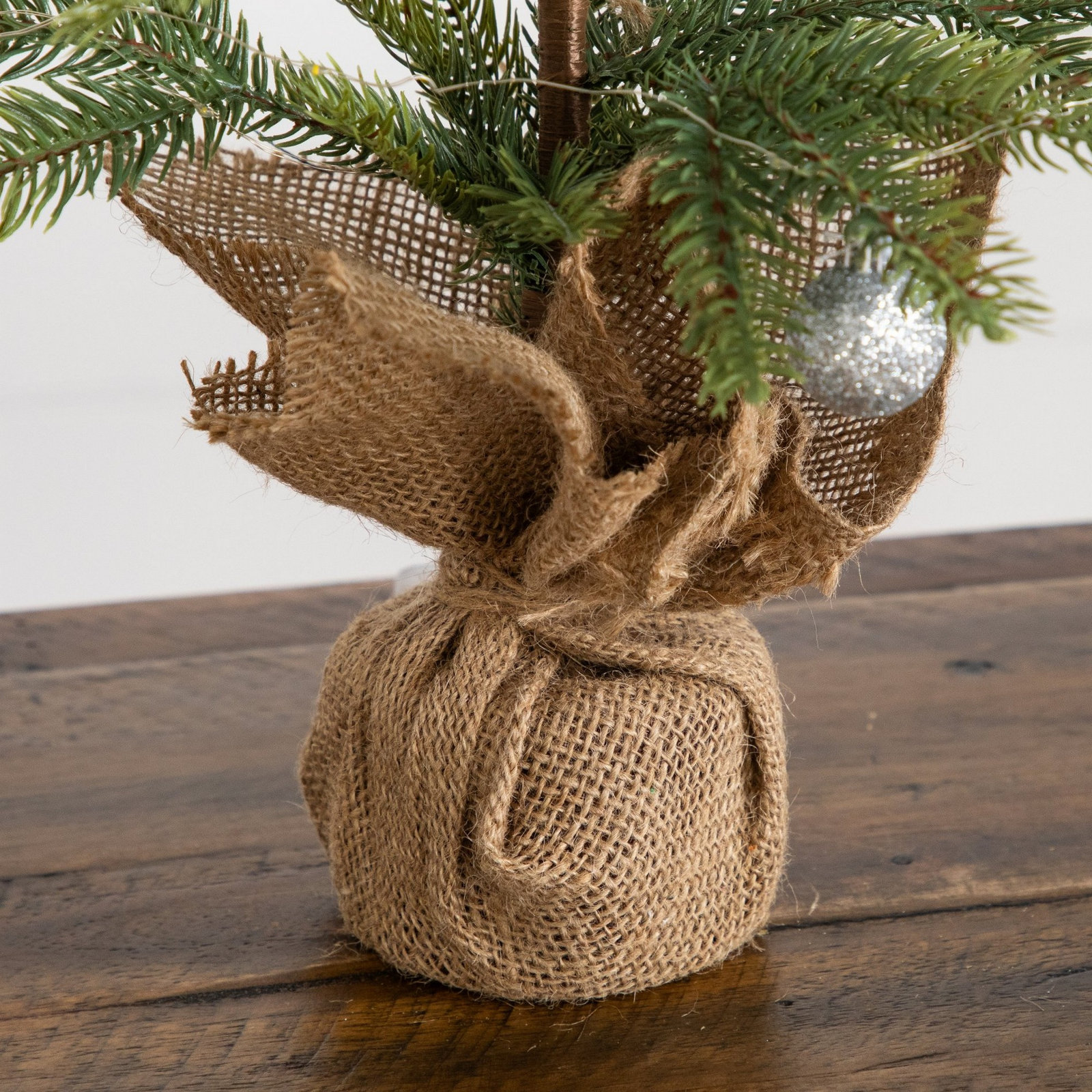 2ft. Pre-Lit Artificial Fraser Fir "Natural Look" Christmas Tree with 20 LED Lights and Silver Ornaments in Burlap Wrapped Base