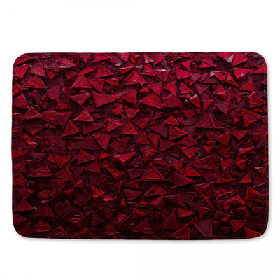 Tapis de bain rouge à texture triangulaire
