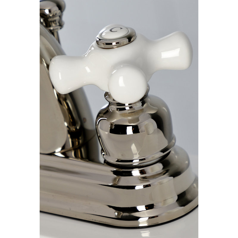 Kingston Brass Restoration Two-Handle 3-Hole Deck Mount 4" Centerset Bathroom Faucet with Plastic Pop-Up, Polished Nickel