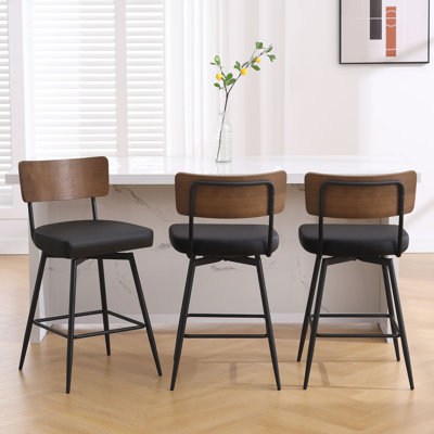 Nelline Swivel Upholstered Faux Leather Counter Stool
