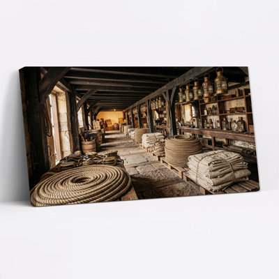 Coiled Rope And Canvas Sails In Wooden Ship Hold Canvas Wall Art
