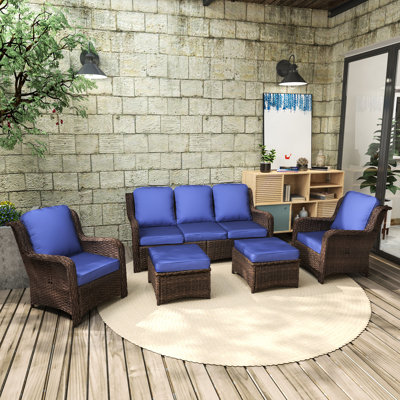 Mobilier de patio extérieur modulaire: avec 3 canapés, 2 chaises simples, repose-pieds. Bleu marine pour la pelouse, la cour, le jardin. Rouille - acier. Tissé fin. Protection contre la décoloration - coussins. Grand confort en mousse. Look moderne