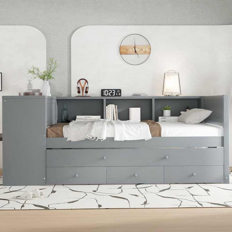 Lit de jour simple fonctionnel avec lit gigogne, tiroirs de rangement, tablettes latérales et bureau, idéal pour économiser de l'espace et une vie confortable