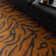 Alaisdair Tiger Animal Print Orange Area Rug
