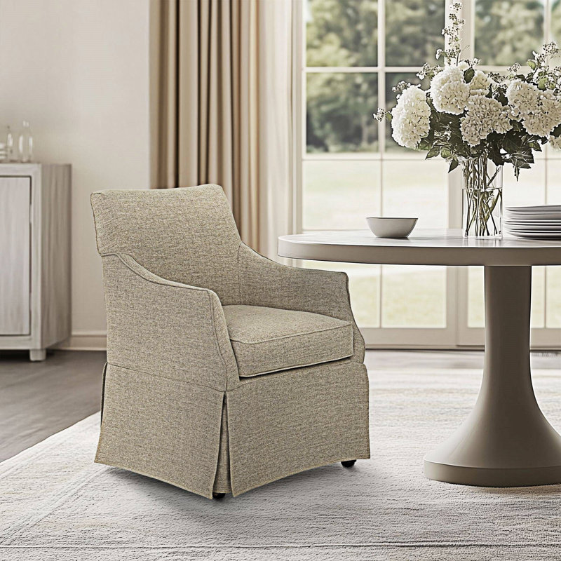 Fauteuil rembourré avec roulettes cachées