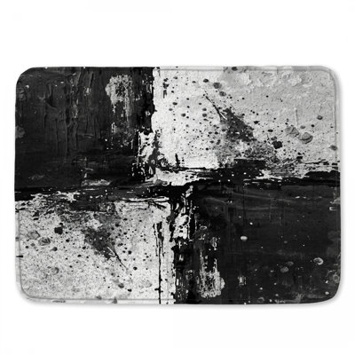 Tapis de bain noir et blanc abstrait