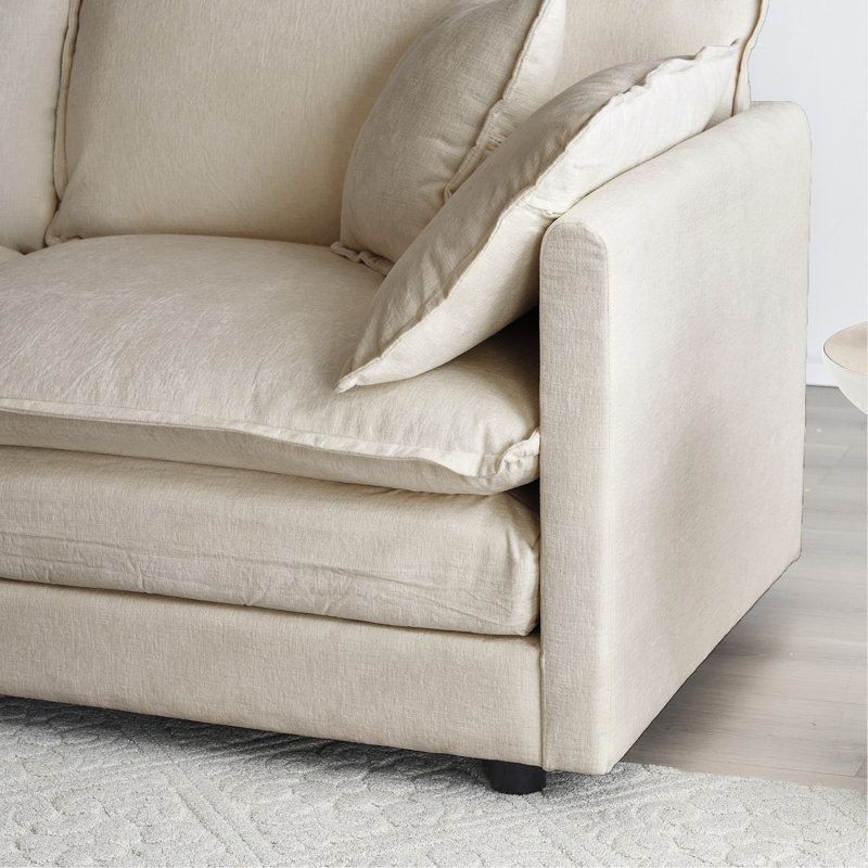 Canapé modulaire en L beige avec revêtement réversible en éponge haute et pour plus de confort
