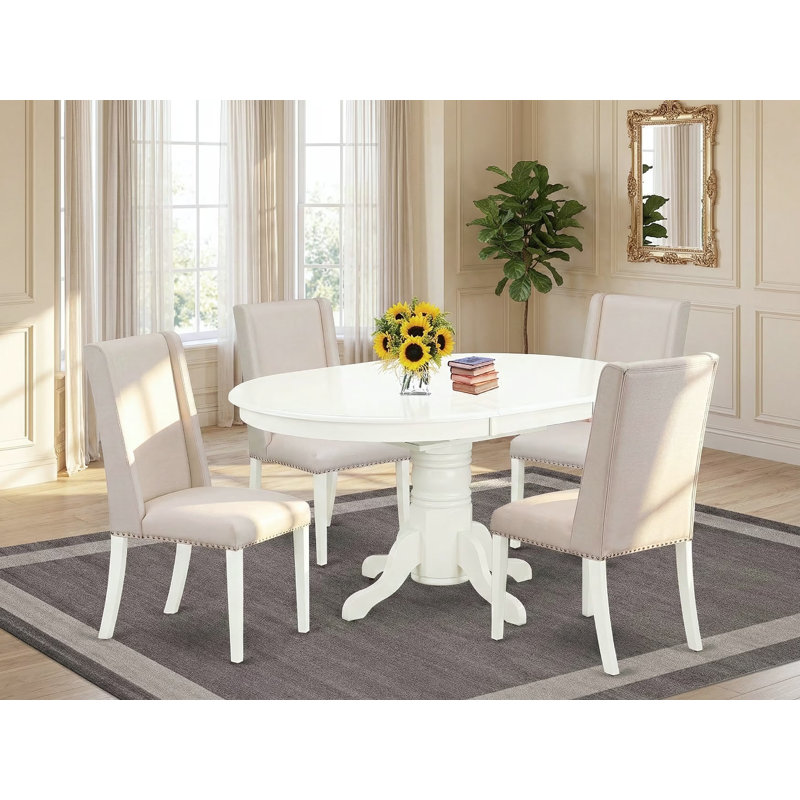 L'ensemble de table de salle à manger 5 pièces pour 4 personnes comprend une table de cuisine ovale avec rallonge papillon et 4 chaises de salle à manger Parson en tissu crème, lin blanc
