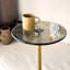 Table d'appoint élégante avec plateau en verre trempé à 100%, finition or et bronze | Dimensions: 9,8 po x 19,7 po x 9,8 po | Structure en métal robuste | Idéal pour le salon, la chambre à coucher ou le bureau | Décoration élégante et fonctionnelle-1473648500-1473648502-1501484470