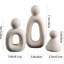 Ensemble de 3 figurines abstraites de famille