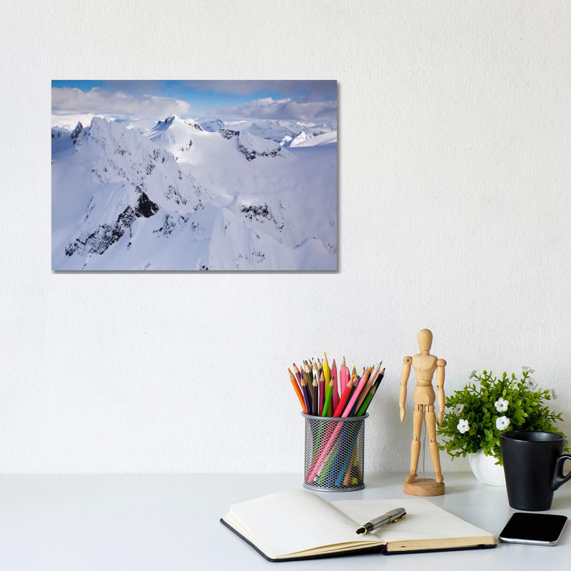 Aerial View Of Deep Snow In The Coast Mountains, Near Squamish And Whistler, British Columbia, Canada by Kristin Piljay - Wrapped Canvas Print