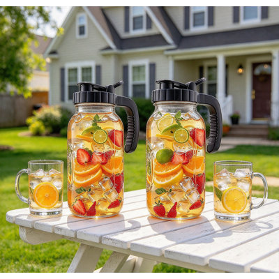 Lot de 2 pichets Mason en verre de 1,9 litre avec couvercle, grande ouverture, idéal pour l'eau, le thé, le café, la limonade, les jus, le lait et le thé glacé. Convient également aux boissons chaudes et froides comme le thé ou le café. Garder au réfrigérateur.