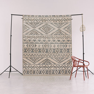 Tapis décoratif moderne à motif géométrique beige et gris
