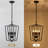 Aonesty 4-light Dimmable Geometric Lantern Chandelier with Wrought Iron Accents-206591560