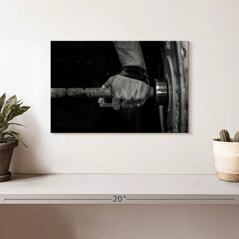 Man holding weights Sireci, H 8 po x l 12 po