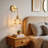 Armed Sconces with Amber Glass Shade