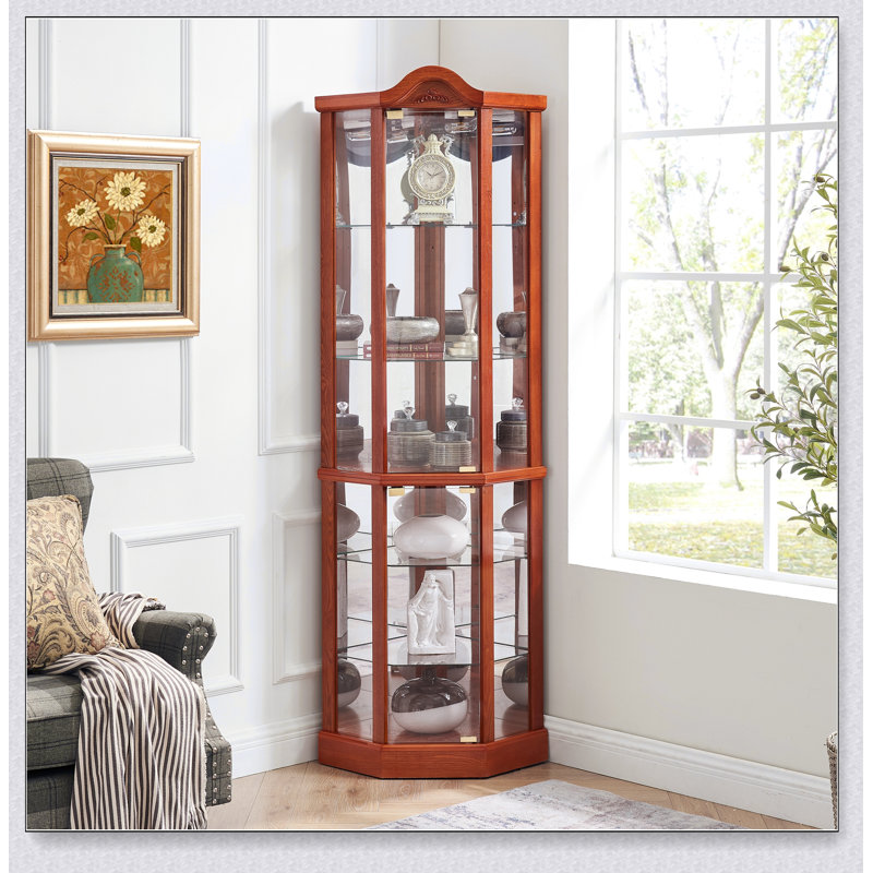 Vitrine d'angle éclairée en verre avec poignées en métal pour un rangement élégant des objets de collection et une décoration intérieure raffinée