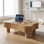 Table basse transformable à plateau relevable avec compartiments de rangement dissimulés et système de réglage hydraulique de la hauteur silencieux