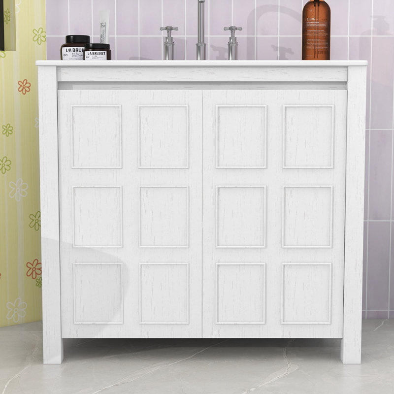 Meuble-lavabo de salle de bain avec lavabo en céramique, tablettes de rangement et portes à fermeture en douceur