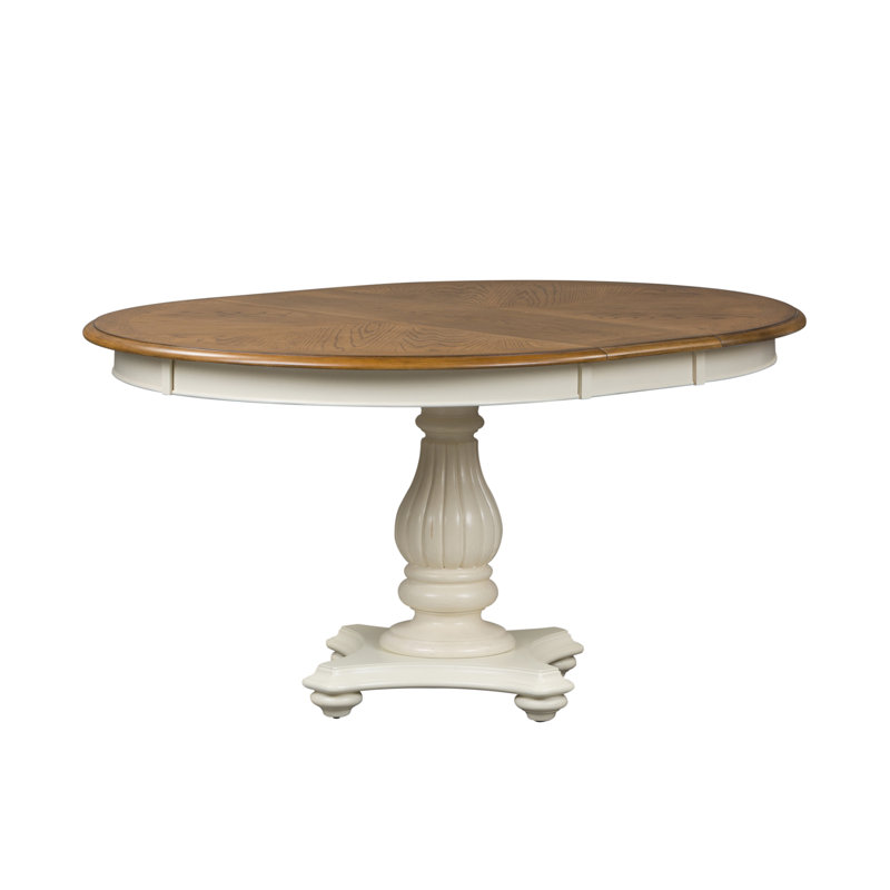 Cleckheat Pedestal Dining Table w/ 12" Leaf
