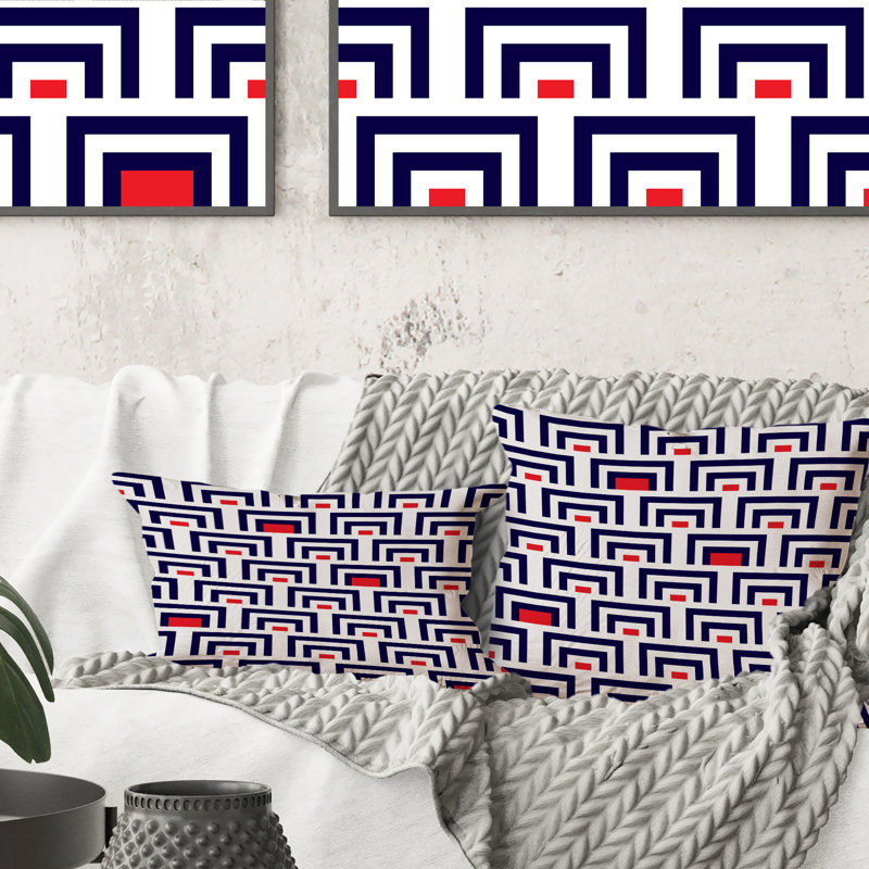 Coussin décoratif à motif géométrique bleu et rouge